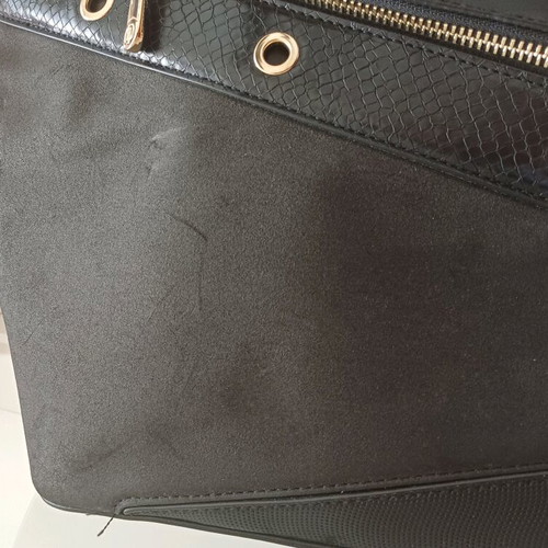 Duki Daso shoulder bag like new, black with gold details