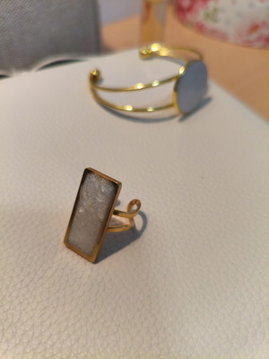 Handmade adjustable statement ring with white resin and gold base