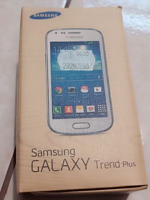 Samsung Galaxy Trend Plus GT-S7580 white used with charger and case