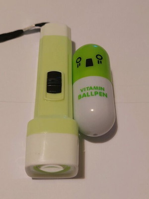 Flashlight and Vitamin Ballpen used like new, pack