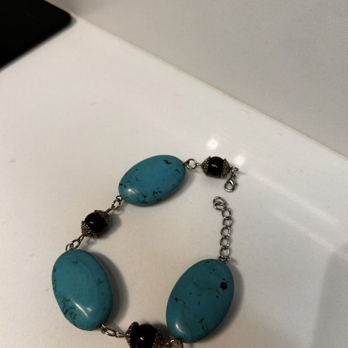 Summer bracelet with blue stones and black beads
