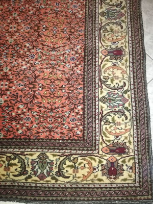 Handmade silk rug used with classic design and warm colors