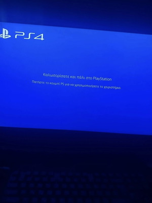PS4 Fat console with power cable and DualShock 4 controller