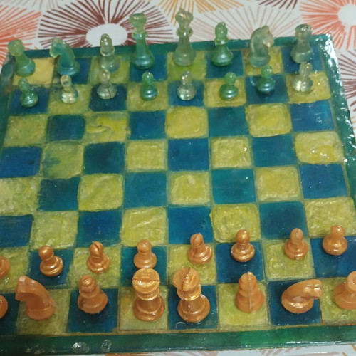 Chess set made of liquid glass resin that glows at night new