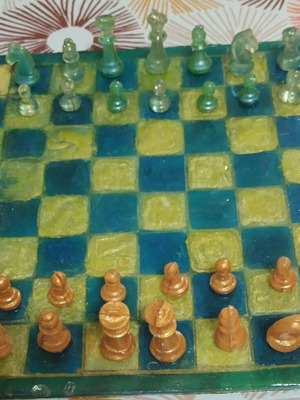 Chess set made of liquid glass resin that glows at night new