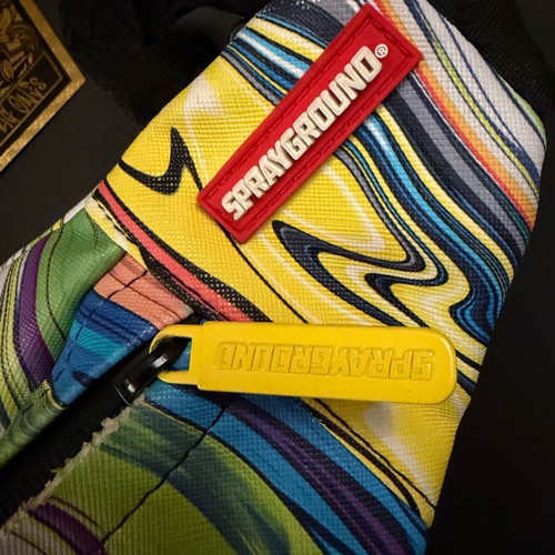 Sprayground Melt Graffiti crossbody bag like new, multicolor