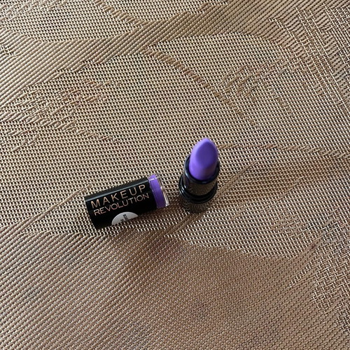 Makeup Revolution Scandalous Lipstick used once, purple shade, moisturizing