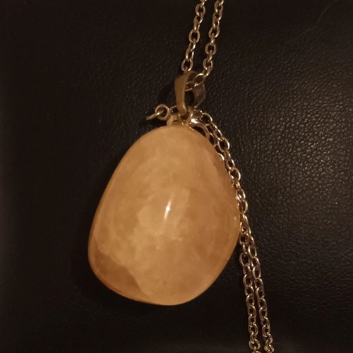 Semi-precious rose quartz pendant on silver chain like new