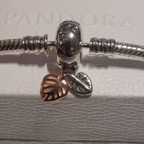 Pandora bracelet size 18 with round clasp and two leaf charms