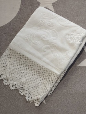Klotsotiras Textiles body towel with embossed design and lace