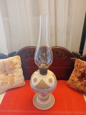 Vintage oil lamp used with intricate beautiful designs