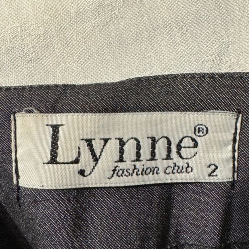 Lynne skirt size M, elastic with side design, like new, gray