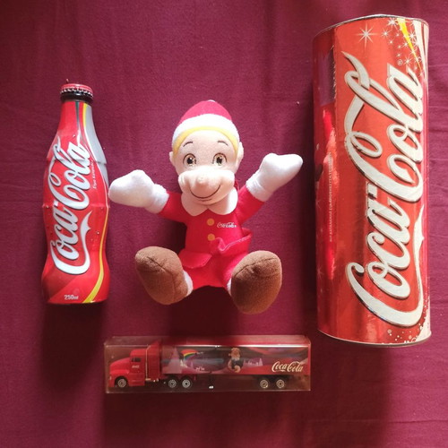 Coca-Cola collectible set new with bottle, truck, plush figure and box