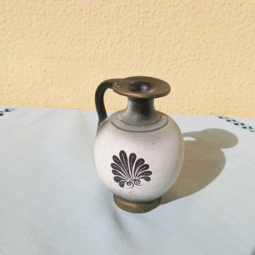 Small amphora new, black color with design and one handle