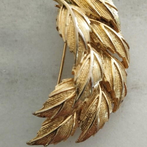 Pin used, old, gold-colored