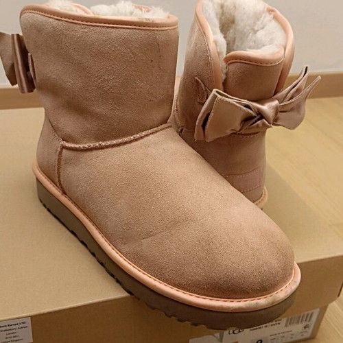 UGG pink boots with satin bow, like new