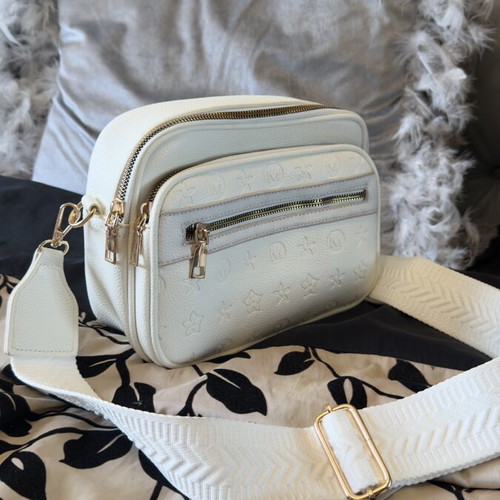White bag with gold details and unique design, new