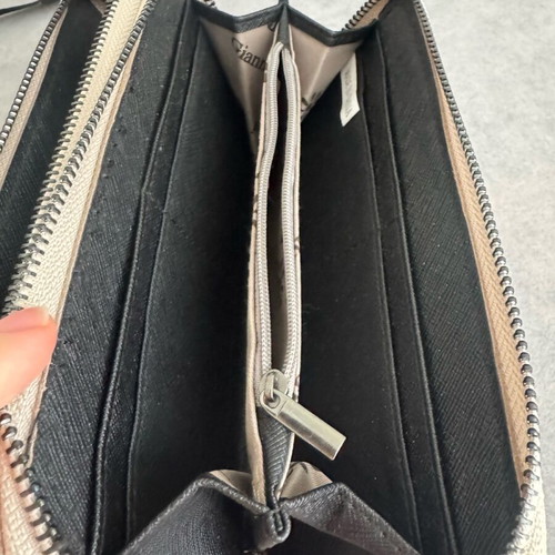 Beige wallet with designs like new