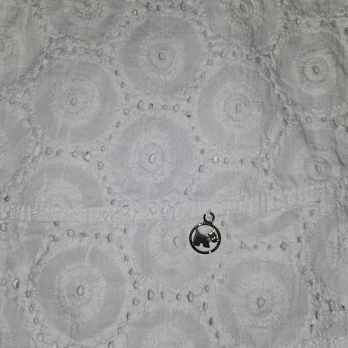 White dress for girl with circular patterns size 8 years like new