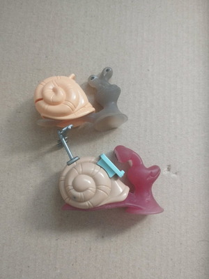 Vintage snail figures used