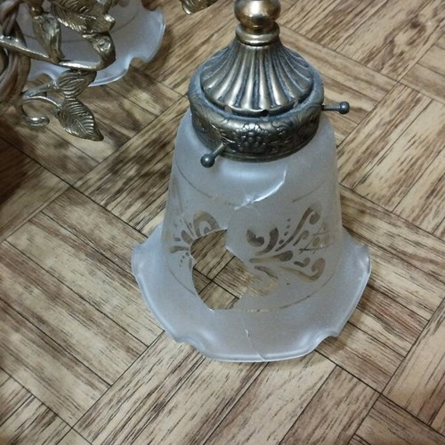 Bronze five-light chandelier used with broken glass
