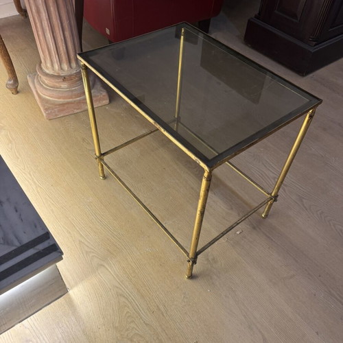 Midcentury metal coffee table with glass base used