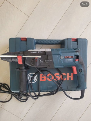 Bosch cordless rotary hammer drill with case and accessories