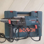 Bosch cordless rotary hammer drill with case and accessories