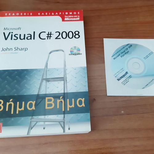 Microsoft Visual C# 2008 book by John Sharp like new with CD