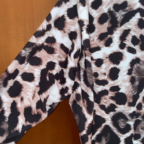 Animal print leopard dress like new with ruching and long sleeve