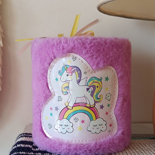 Fluffy pink pencil holder with unicorn design