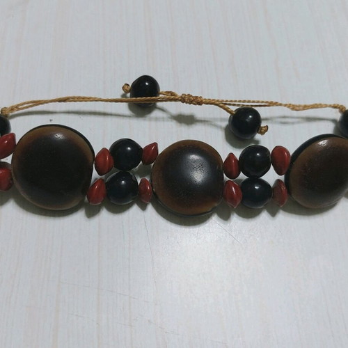 Wooden bracelet like new made from coconut with adjustable cord