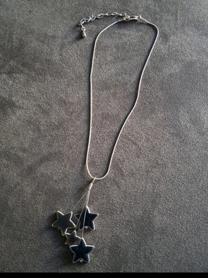 Necklace with chain like new with star design in blue-gray color