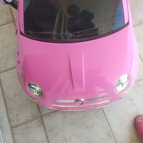 Children's Car Pink electric car with battery and charger. FIAT 500