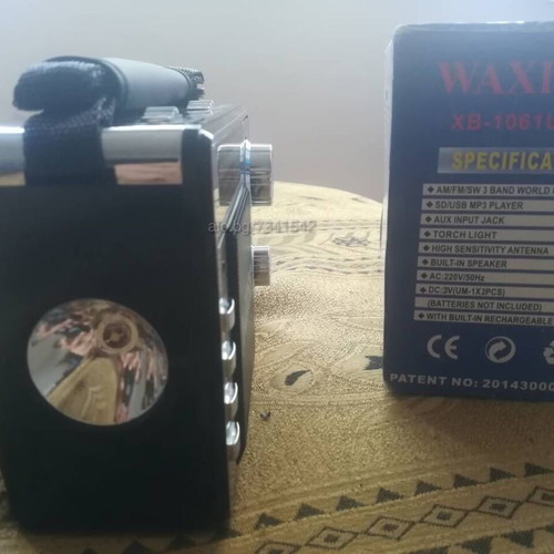 Portable rechargeable radio with flashlight, MP3, USB, SD card, green