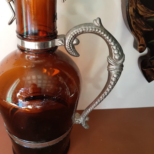 German vintage beer bottle growler with metal handle