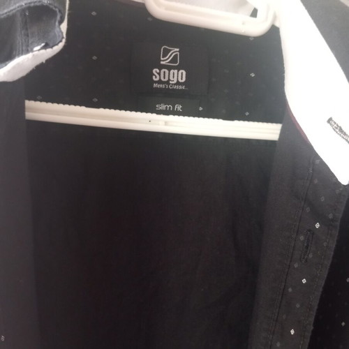 Black shirt with white dots, size S