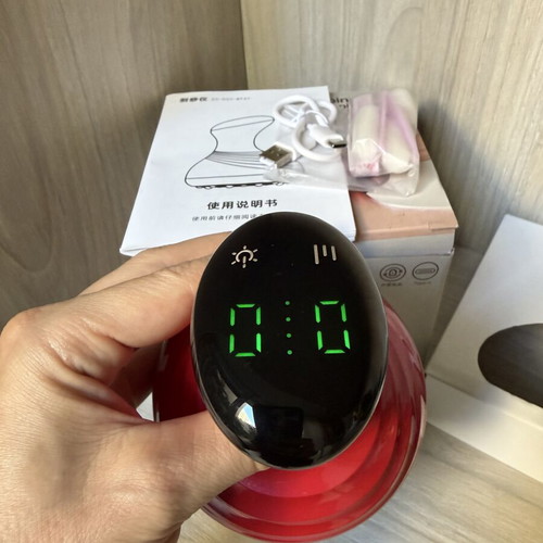 Electric body massage device with cupping and heating