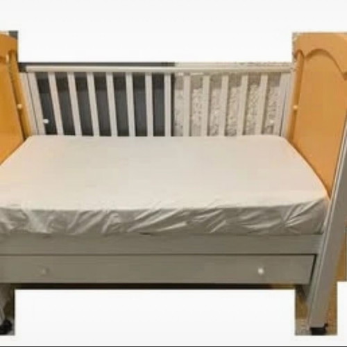 Children's cot and mattress used with drawer and adjustable rails