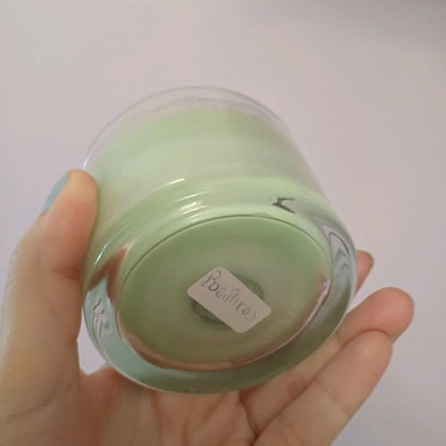 Handmade mosquito repellent candle with basil used