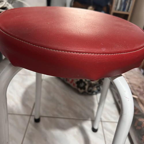 Stool with metal legs and red seat like new