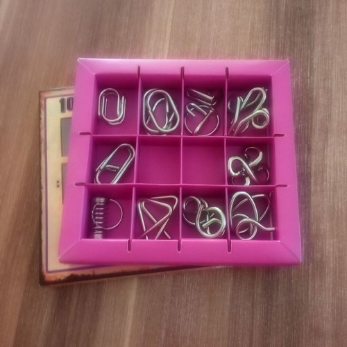 Metal puzzle set of 10 purple pieces like new, for kids 7+
