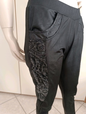 Black women's leatherette-style leggings XL-XXL like new