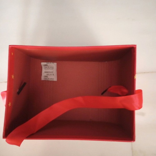 Christmas basket new made of pressed paper with ribbon