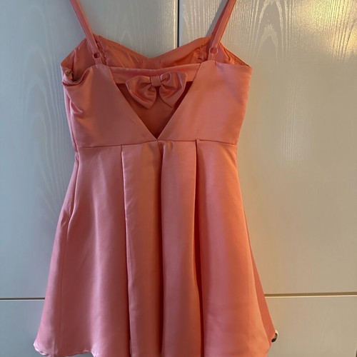 Peach dress like new size L with bow detail on back