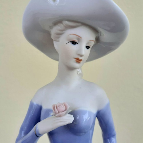Vintage figurine of aristocratic lady with dog porcelain like new