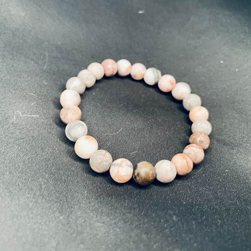 Handmade boho bracelet with pink beads
