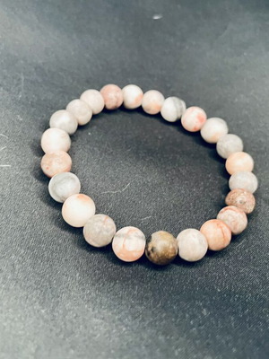 Handmade boho bracelet with pink beads