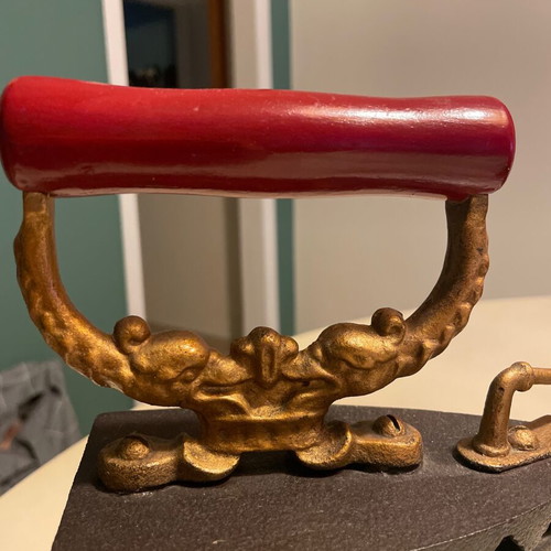 Vintage cast iron charcoal iron with wooden handle and bronze details, like new, 1950s