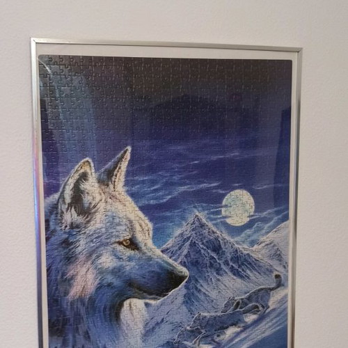 Puzzle frame used that glows in the dark 51x71